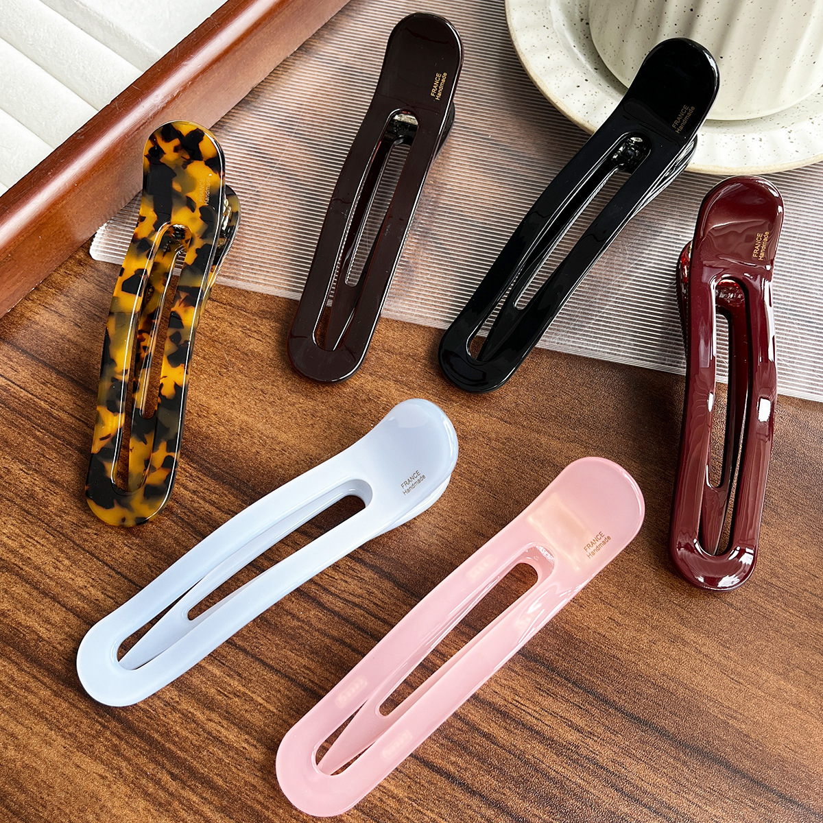 Temperamento de alta calidad engrosado ácido acético una palabra elíptica boca de pato abrazadera de cabello de tiburón perezoso universal abrazadera para el cabello de tiburón