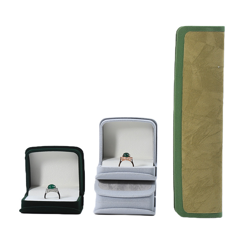 Caja de joyería de doble color arco flocado caja de collar de anillo sensación alta caja de almacenamiento de pernos caja de embalaje de joyería