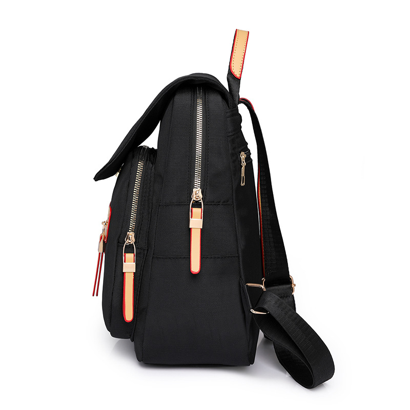 Mochila de nailon para mujer 2024 nueva mochila de viaje simple y de moda mochila de viaje de gran capacidad antirrobo al por mayor