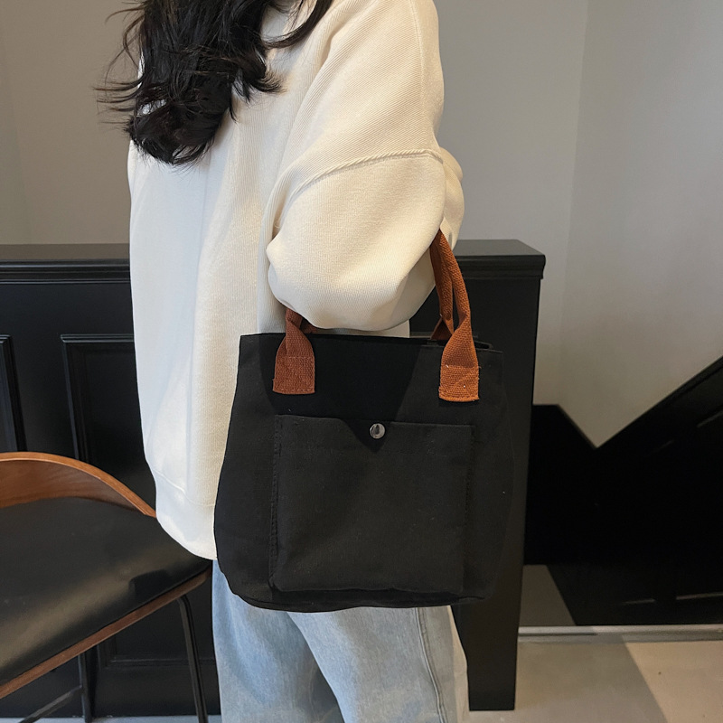 2024 nuevo bolso de lona para mujeres tela japonesa retro simple versátil Harajuku bolso de mano de color sólido casual de moda para mujeres