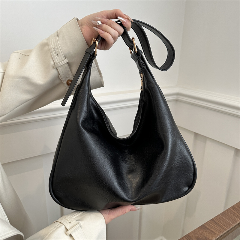 2024 primavera nuevo all-matching ins bolsa de asas para las axilas Este año de moda de estilo coreano con textura bolsa de hombro para mujeres