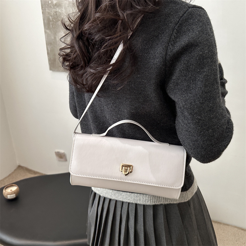 2025 nueva primavera de mujeres bolsas axila francesas nichos bolsas de moda de bloqueo bolsas de hombro para mujeres coreanas image 1