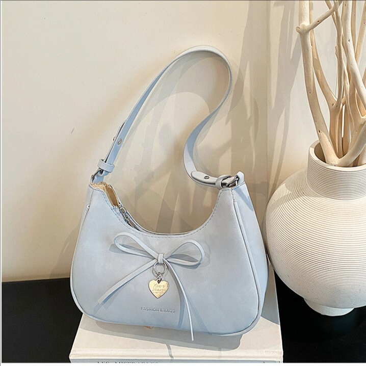 2026 New Korean-Style Niche Underarm Bag for Women, Cute Bowknot Plush Pendant, Fashionable Versatile Shoulder Bag for Commuting 2026 New Korean-Style Niche Underarm Bag for Women, Cute Bowknot Plush Pendant, Fashionable Versatile Shoulder Bag for Commuting