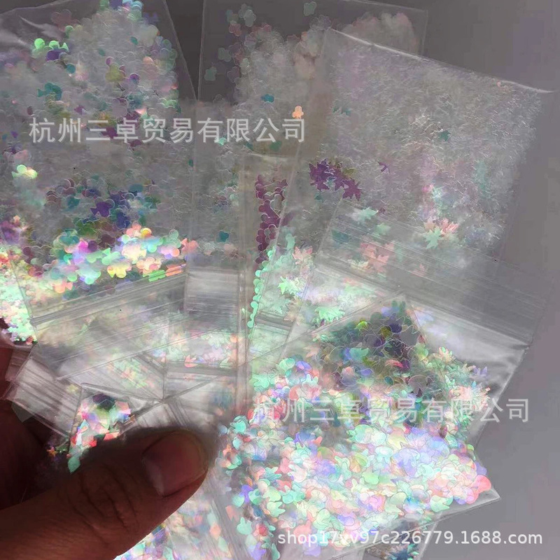 Wholesale popular white transparent cartoon series high quality sequins nail art phone case DIY decorative crafts