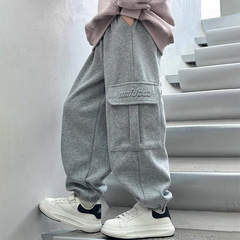 子供服、男の子用レギンス、中型および大型子供用スポーツカジュアルパンツ、韓国風スウェットパンツ、ファッショナブルでハンサムなズボン、トレンディなスタイル
