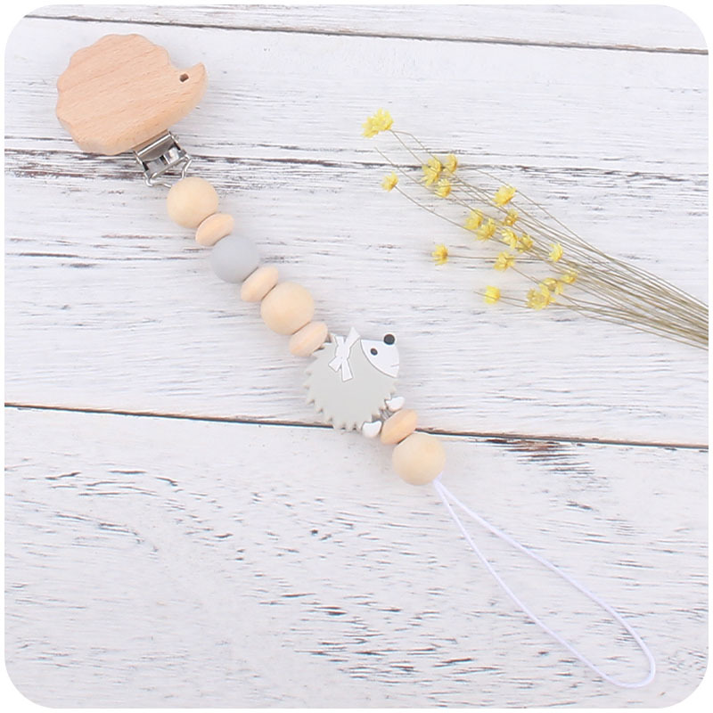 Suministros para bebés Hemu pulsera molar juguete para niños erizo cochecito Cadena de tres piezas creativa pezón cadena colgante