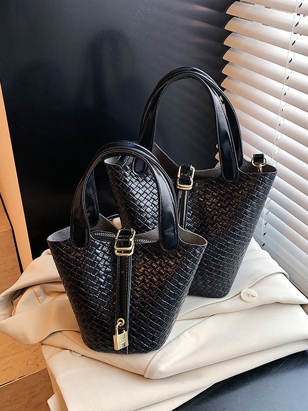 Bolso de cubo portátil con patrón tejido para mujer 2025 nuevo estilo coreano de lujo ligero de alta gama bolso de mensajero para niños de nicho