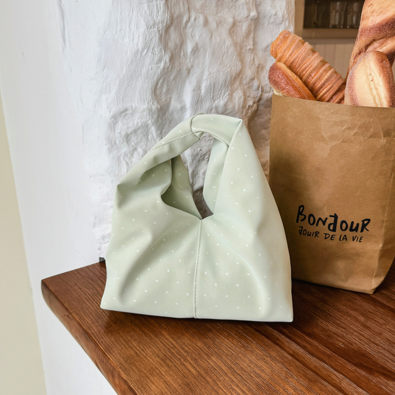 2026 nuevo punto de onda de moda de mujeres bolsos de escuela de estilo extranjero retrógrado nicho de verano monzón literatura y arte bolsos de mano de gran capacidad