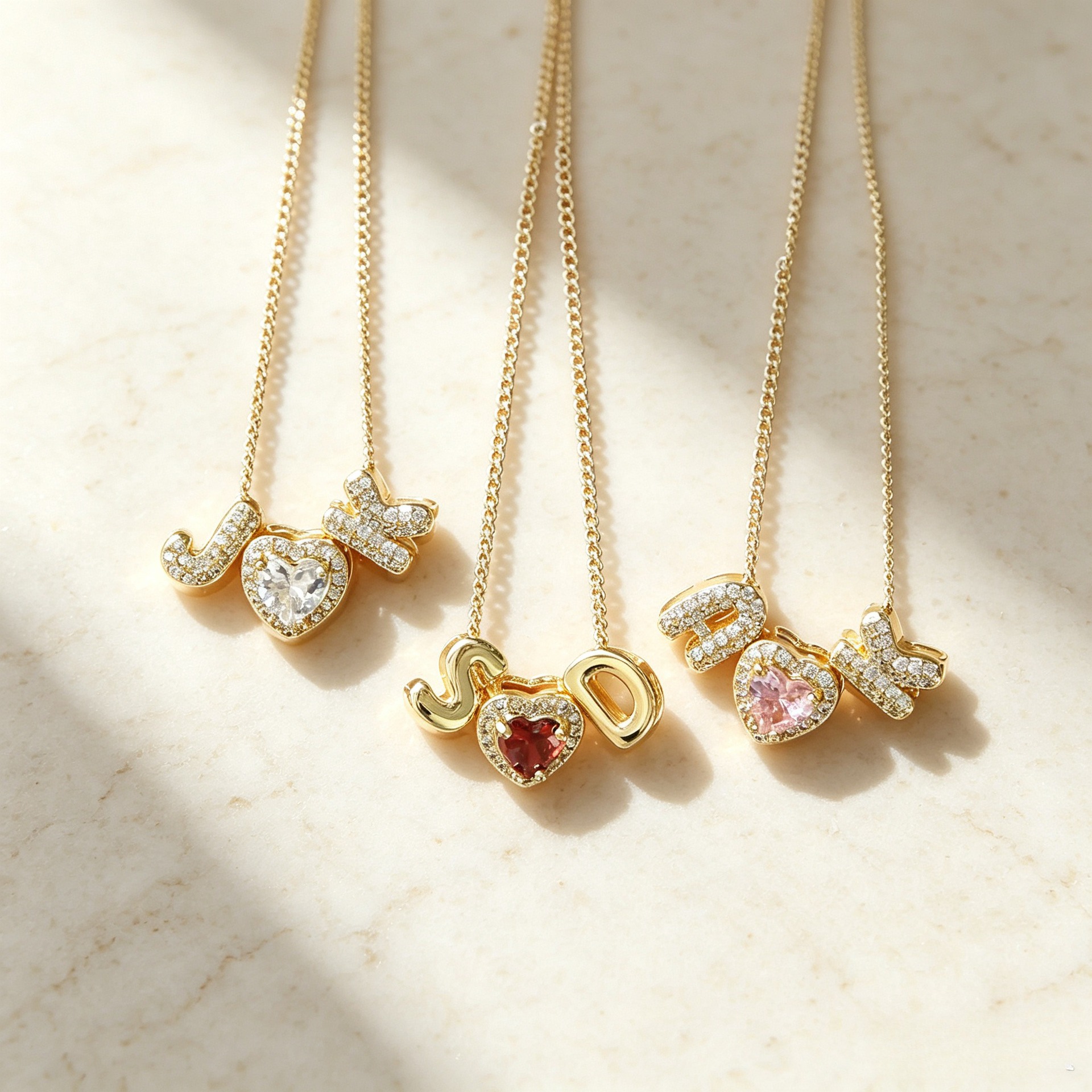 Cross-border new December heart-shaped birthstone pendant, featuring 26 English letters in gold and silver, a heart-shaped necklace for women