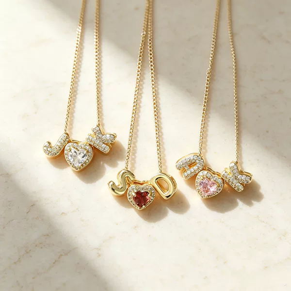 Cross-border new December heart-shaped birthstone pendant, featuring 26 English letters in gold and silver, a heart-shaped necklace for women