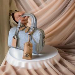 高顏值法式手提波士頓包2024時尚新款牛仔布單肩斜挎包枕頭包