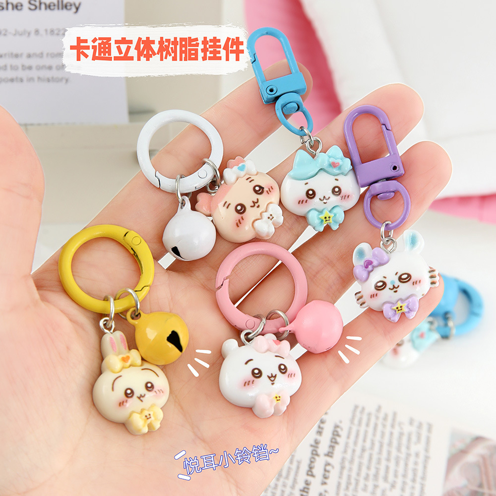 Caricatura linda corbata pequeña ocho llaveros colgantes pareja amigas bolsos colgantes de alto valor de belleza llaveros de corazón de niña