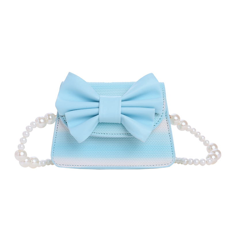 2026 nuevo bolso infantil lindos arco princesa bolso de perlas de color gradiente mini mochila