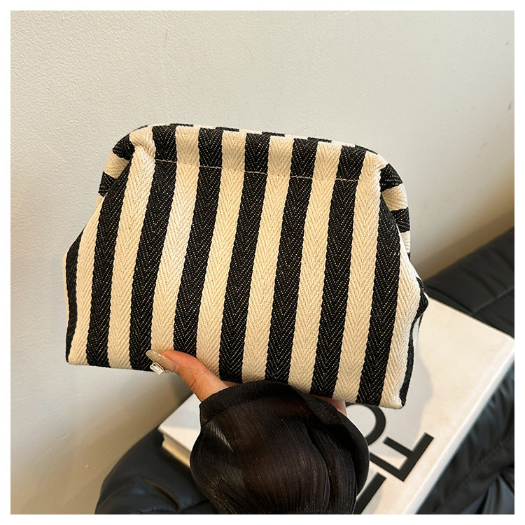 New cross-border fashion color-blocking striped cosmetic bag, women's loose change mobile phone storage bag, trendy and niche cloud clutch undefined