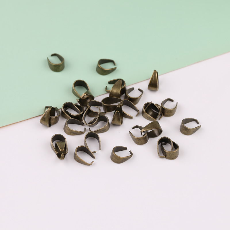 Diyアクセサリーの金属の瓜のボタンのネックレスのペンダントの装飾品は口を開けて鉄のボタンのペンダントを掛けます。|undefined