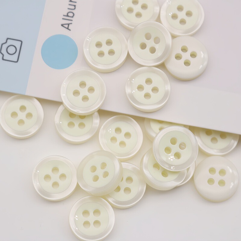 In-Stock European Standard Eco-Friendly Resin Shirt Buttons, Bowl-Shaped Beige Pearlescent Edge Shirt/Cardigan Buttons, Four-Hole Pearlescent Buttons In-Stock European Standard Eco-Friendly Resin Shirt Buttons, Bowl-Shaped Beige Pearlescent Edge Shirt/Cardigan Buttons, Four-Hole Pearlescent Buttons
