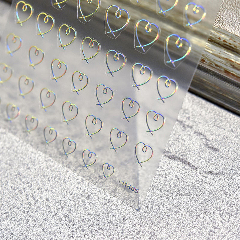 Nuevo arte japonés pegatinas de uñas dorado anillo corazón hueco láser línea de plata términos parche de uñas simple y fresco