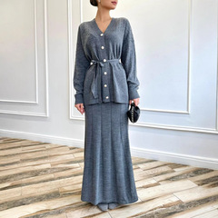 2025春の新型越境欧米の外国貿易の婦人服の純色の長袖のボタンのコートの半身のスカートのファッションのスーツ