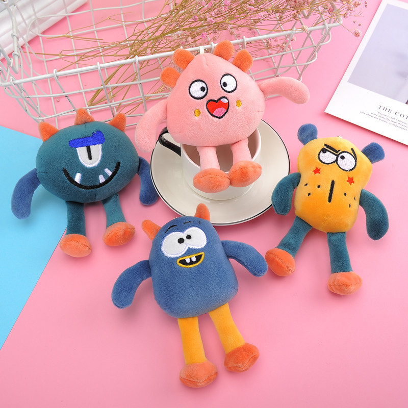 アニメのかわいいおかしな目の小さい怪獣のぬいぐるみのペンダントの学生のぬいぐるみのバッグのキーホルダーの飾り|undefined