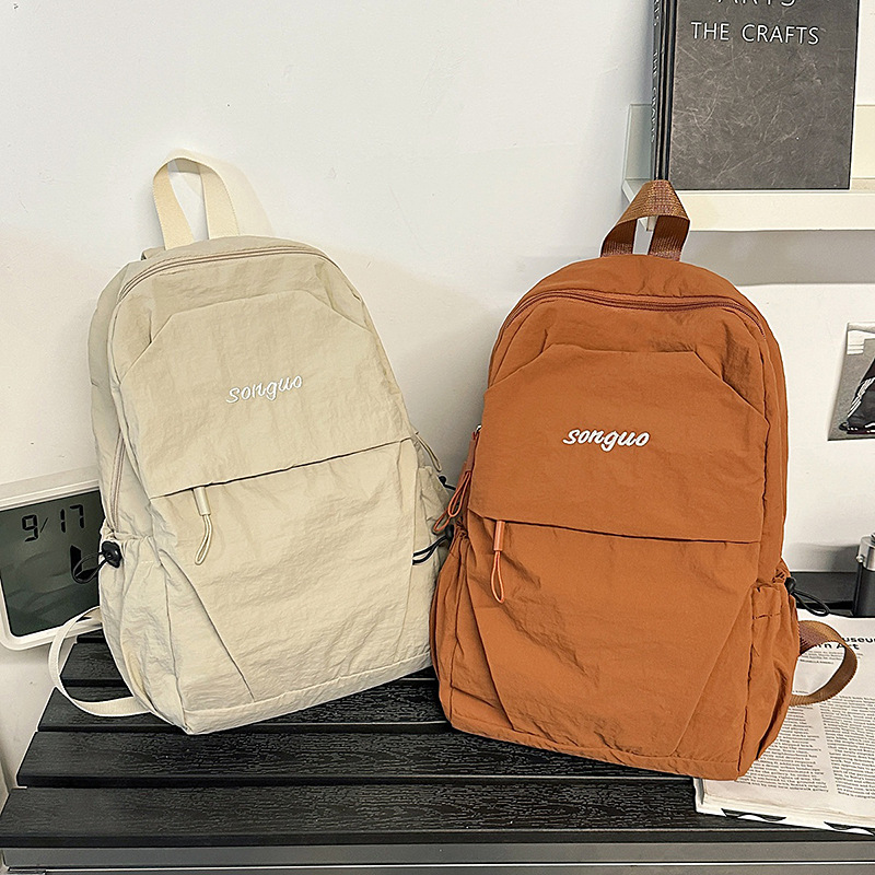 2025 New Simple Casual Backpack Shopping and Traveling Mountaineering Bag Men and Women Lightweight Fashionable Outdoor Sports Backpack