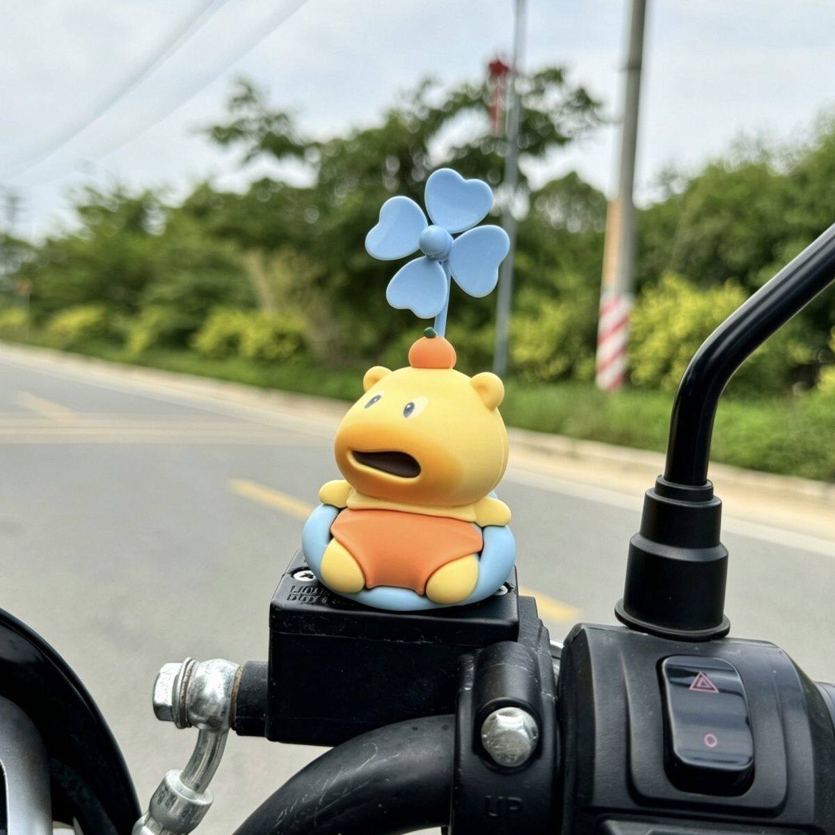 Electric vehicle decoration capybara Lulu rotating windmill, universal cute decorative toy pendant for bicycles and motorcycles