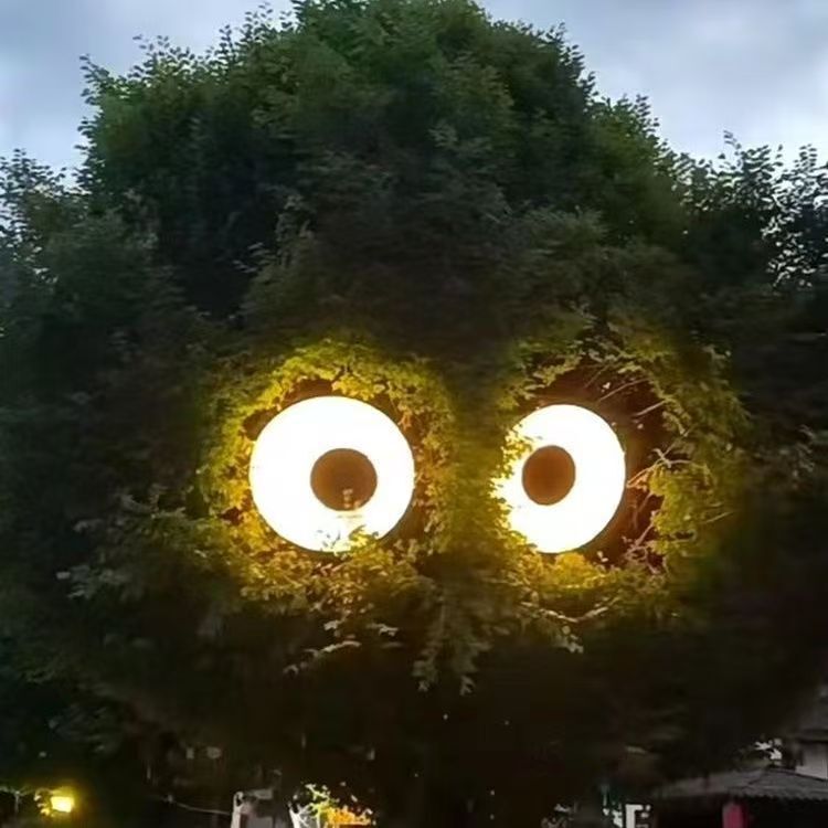 Decorative creative lamps that can rotate eyes. Internet-famous big trees can move and rotate big eyes expression lamps