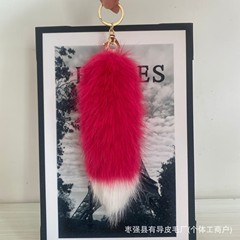 防圧狐狸のしっぽのストラップは毛の色合わせのカバンのストラップのかわいいストラップに似せています。