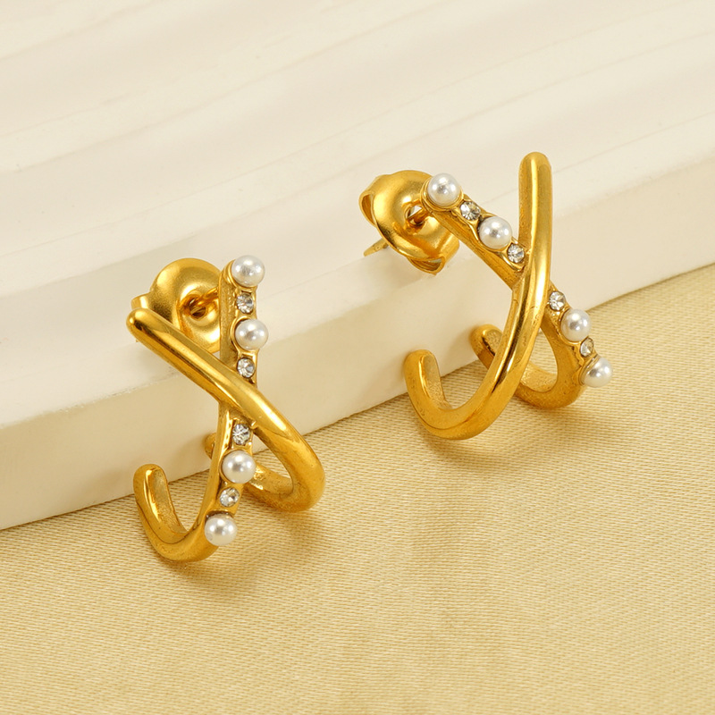 Cruzar la frontera europea y americana de acero de titanio X Cruz perla pendientes de alto grado pendientes de moda elegantes pendientes de acero inoxidable pendientes de las mujeres