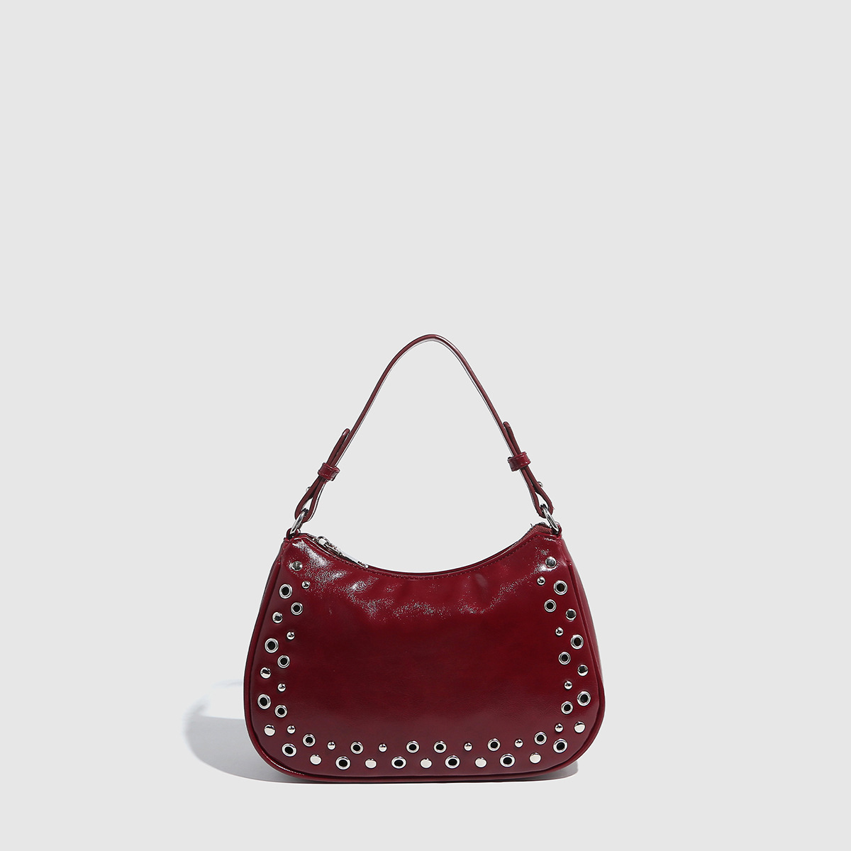 Transfronterizo 2025 nuevo remache hueco ajustable bolso punk bolso de muñeca con cremallera bolso de mujer al por mayor