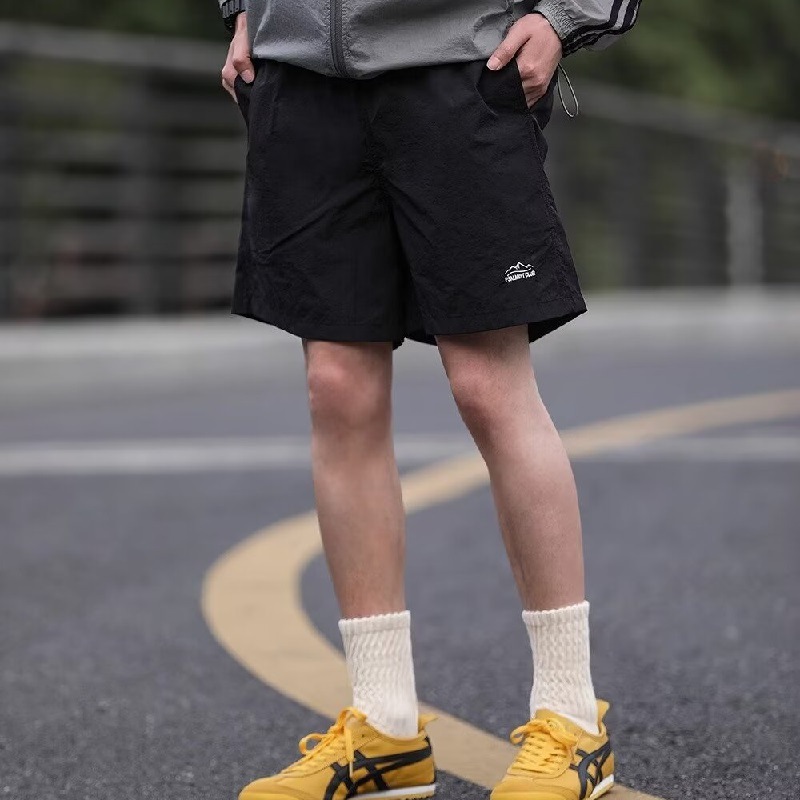 Summer Japanese travel solid color quick dry sports shorts for men…