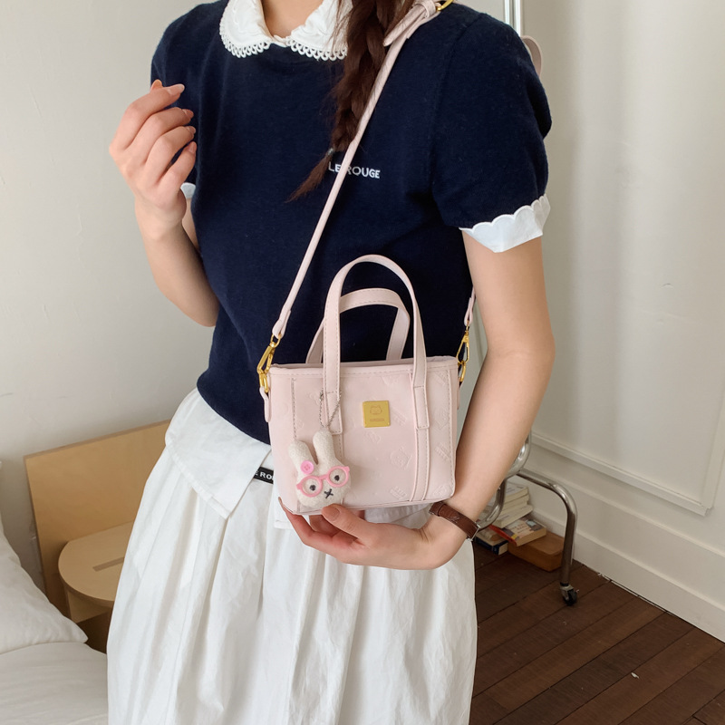 Borsa a secchiello in rilievo donna, elegante borsa a tracolla_voghion.com