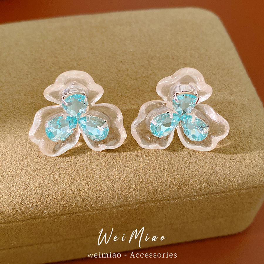 Agujas de plata zircón azul resina flor pernos pequeños frescos dulces temperamento versátil pendientes ligeros de lujo alta sensación de pendientes