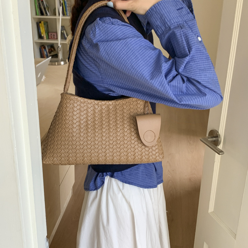 Bolsas de tejido casuales transfronterizas texturas bolsas de brazo mujeres otoño y invierno 2025 nuevo bolso de estilo extranjero bolso de hombro de moda