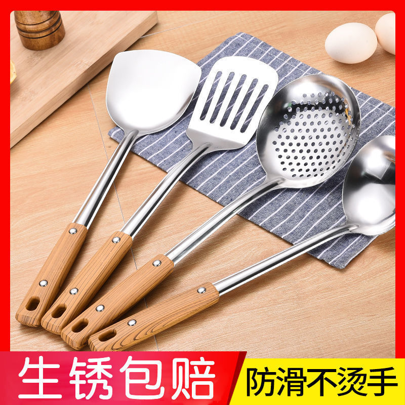 フライパンのフライパンのスプーンはステンレスの台所の料理道具を漏らしてお粥のスプーンのセットの家庭用台所用品の炒め物のシャベルを厚くします。|undefined
