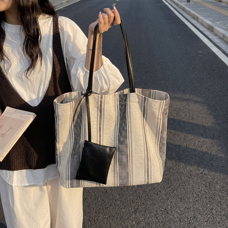 Bolso de mujer 2026 nuevo tela tela alta alta calidad gran capacidad simple ocio versátil bolso de hombro