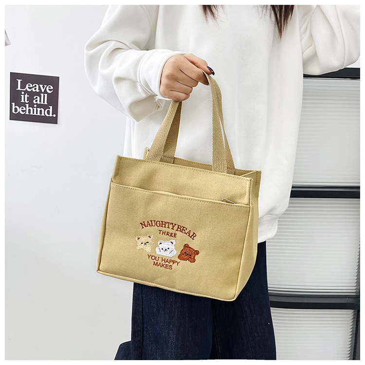 New wholesale fashionable and high-quality canvas handbag, simple and portable, easy to carry for going out, versatile lunch box and bento bag undefined