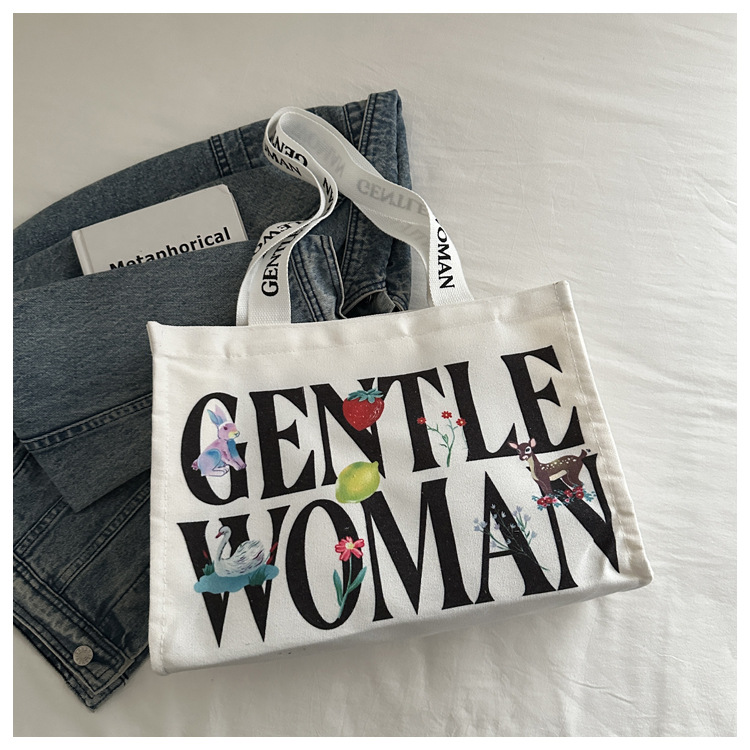 Large-capacity letter canvas bag 2025 new style ins printed versatile shoulder bag for commuting and portable ladies' tote bag undefined