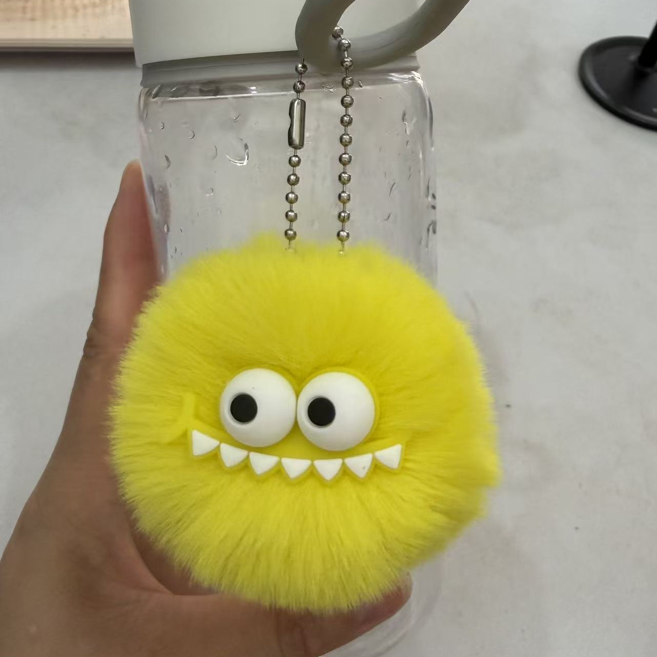 Cute pequeño Du dinosaurio peluche coche llavero colgante de pelo de dibujos animados bola de pelo monstruo muñeca bolsa colgante al por mayor image 2