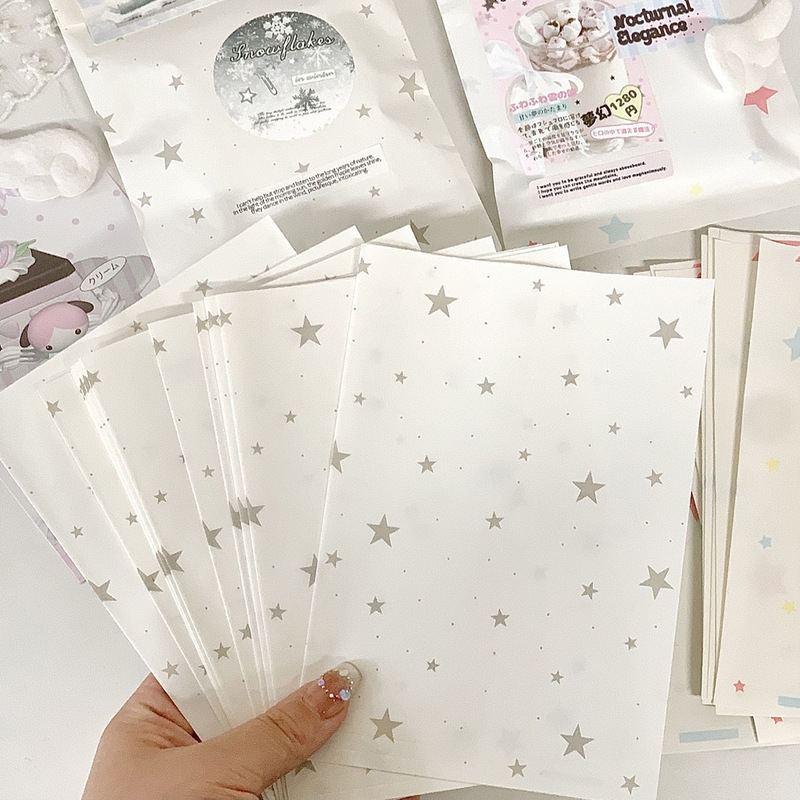 The same stylish packaging bags as used by the blogger: silver star-patterned paper bags, sealing bags, gift bags, and self-sealing bags for notebooks and other items