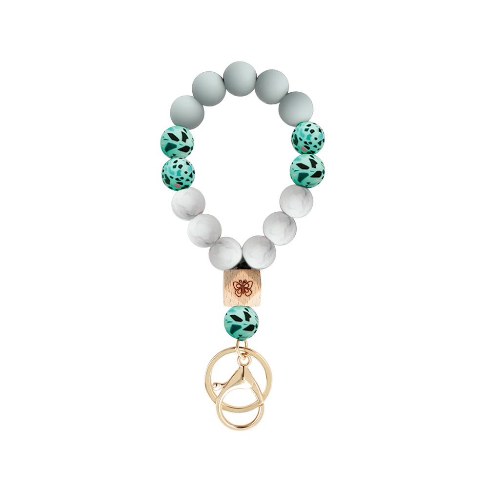 Amazon europeo y americano popular silicona muñeca llavero hecho a mano con cuentas de cuero borla pulsera al por mayor