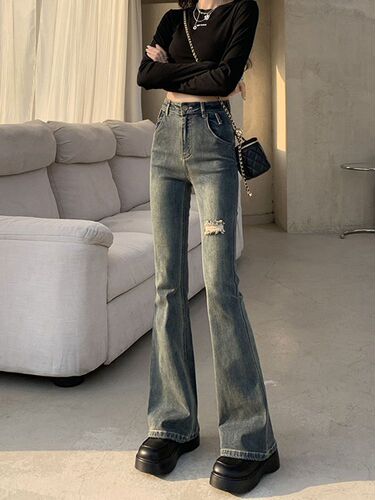 Fashionable high street hot girl micro-trumpet jeans women's spring and autumn new style broken hole design high waist slimming all-matching horseshoe pants