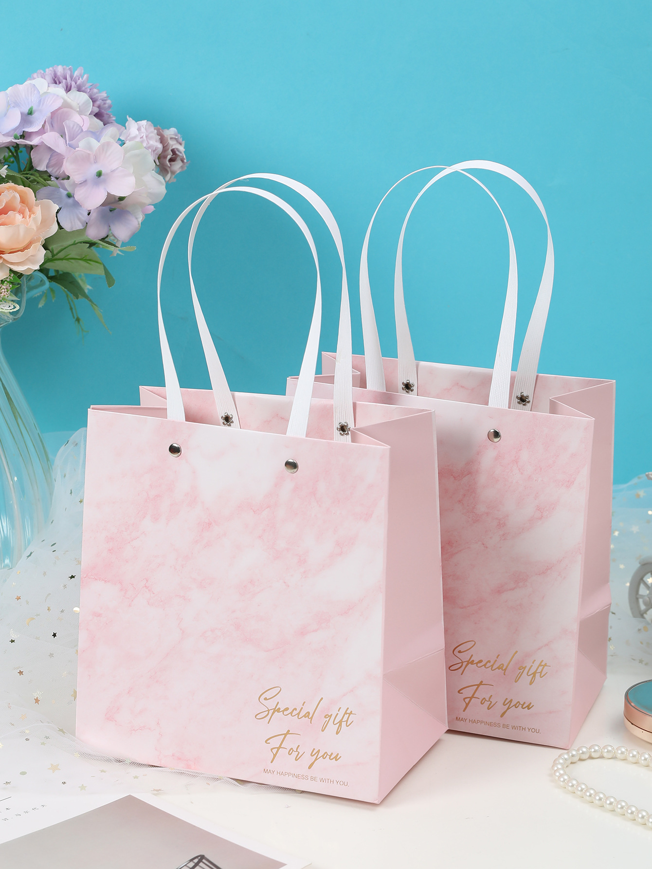 Remache bolsa de regalo bolsa de papel bolsa de compras de ropa bolsa de regalo de cumpleaños en stock bolsa de regalo de mármol rosa
