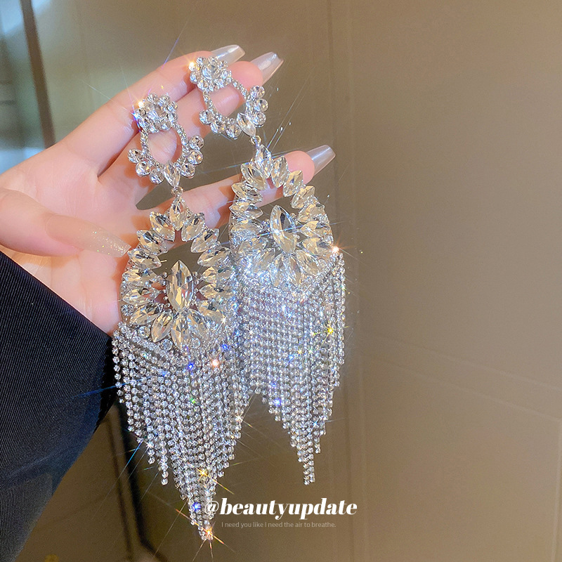 Aguja de plata diamante flor hueco pendientes de gota de agua personalidad exagerada larga borla pendientes moda europea y americana pendientes de la industria pesada