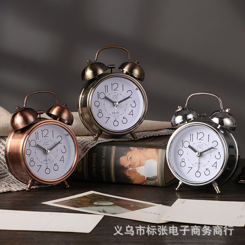 Reloj despertador de campana de metal retro creativo Reloj mudo de 3 pulgadas Reloj de cabecera de dormitorio de estudiante Reloj luminoso Fábrica al por mayor