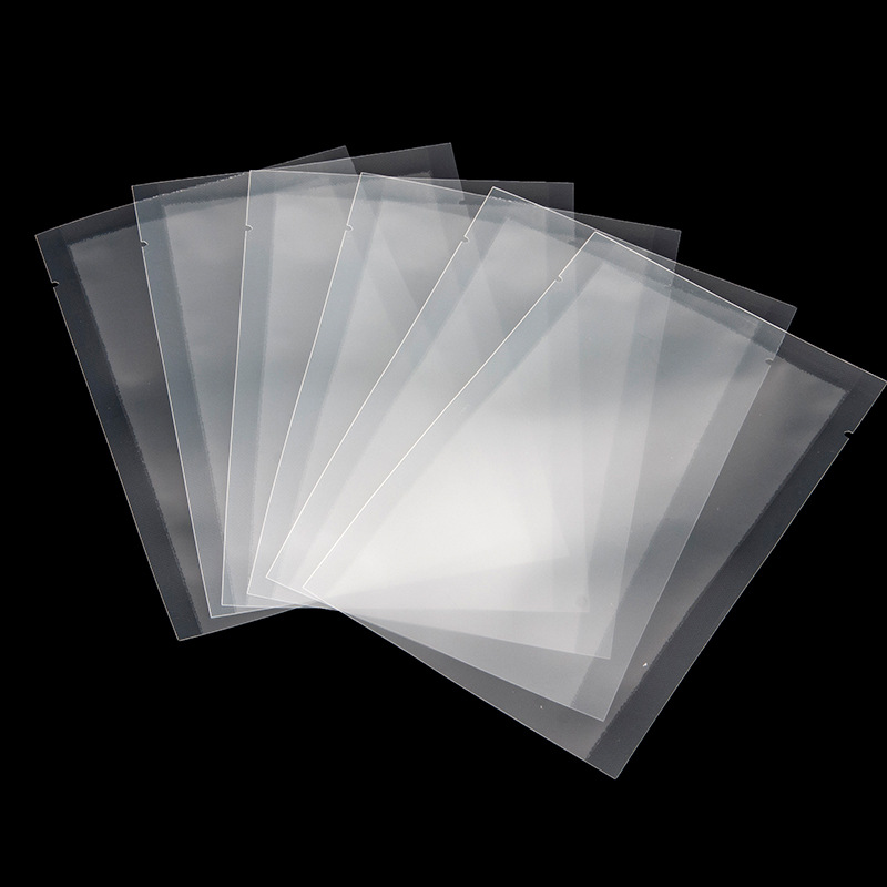 Bolsa sellada brillante Bolsa de embalaje de plástico para alimentos Bolsa de embalaje al vacío gruesa al por mayor Bolsa de plástico al vacío transparente fácil de rasgar