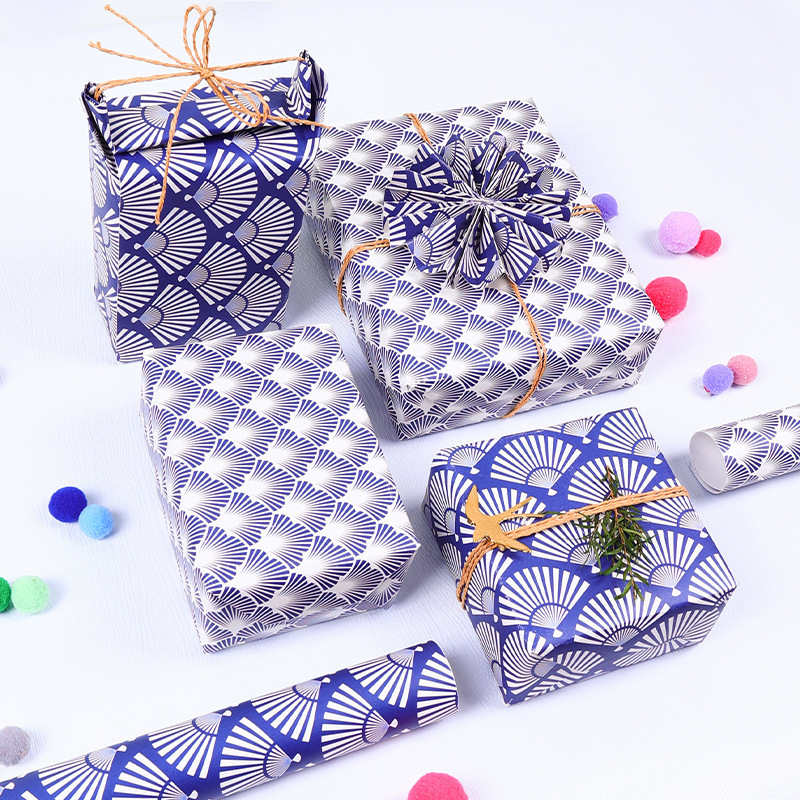 Nuevo ventilador estilo nacional papel de regalo de dibujos animados patrón azul DIY regalo papel de regalo al por mayor