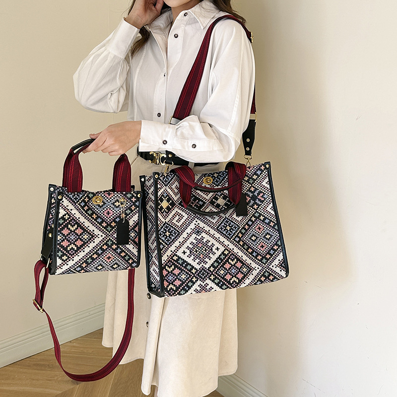 Gran capacidad lona Plaid Portátil Bolsa femenina 2024 transfronteriza primavera nuevo trabajo viajero hombro bolsa de mensajero