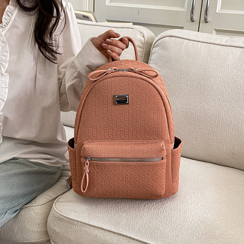 Mochila de moda coreana para mujeres simple color sólido mochila de viaje de gran capacidad 2026 nueva mochila de viaje al trabajo