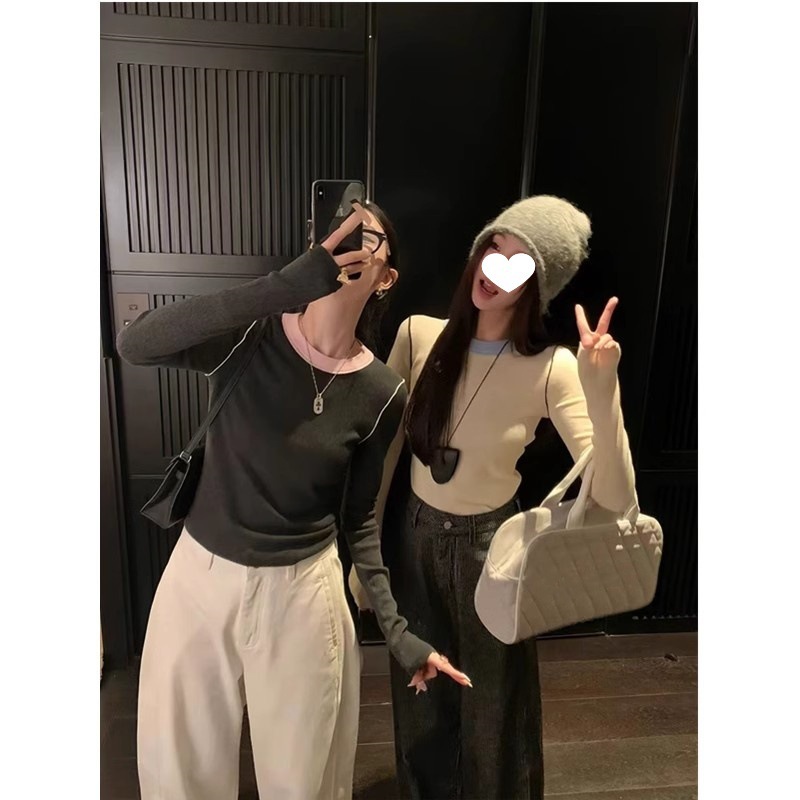 欧陽は色のニットの女性の冬の新型の丸首の中で底のシャツを掛けて身を修めるのがやせている長袖の上着を現します。|undefined