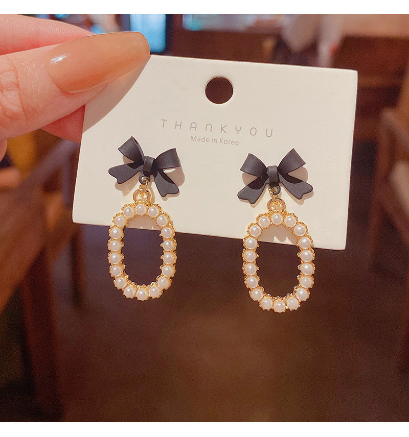New Fashion Bow Inlaid Pearl Alloy Drop Earrings display picture 7